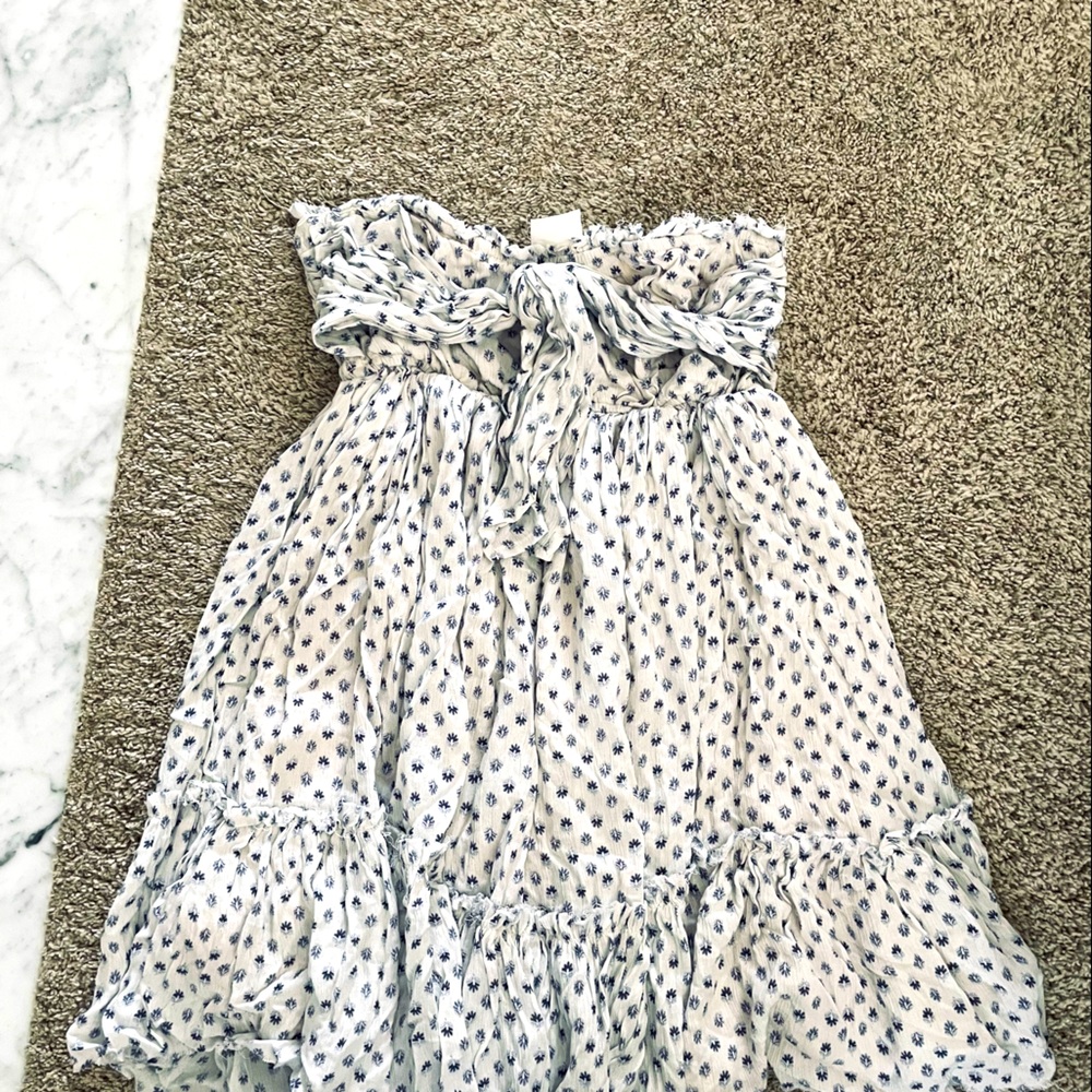 Strapless midi dress, with distressed hem